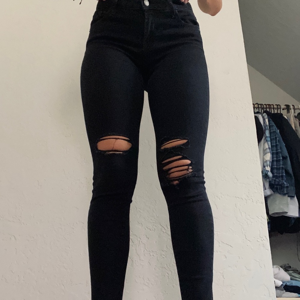 ripped black jeans